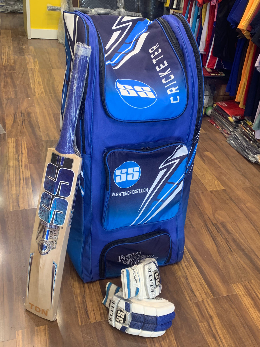 SS Select Duffle Cricket Kit Bag along with a cricket bat and batting gloves